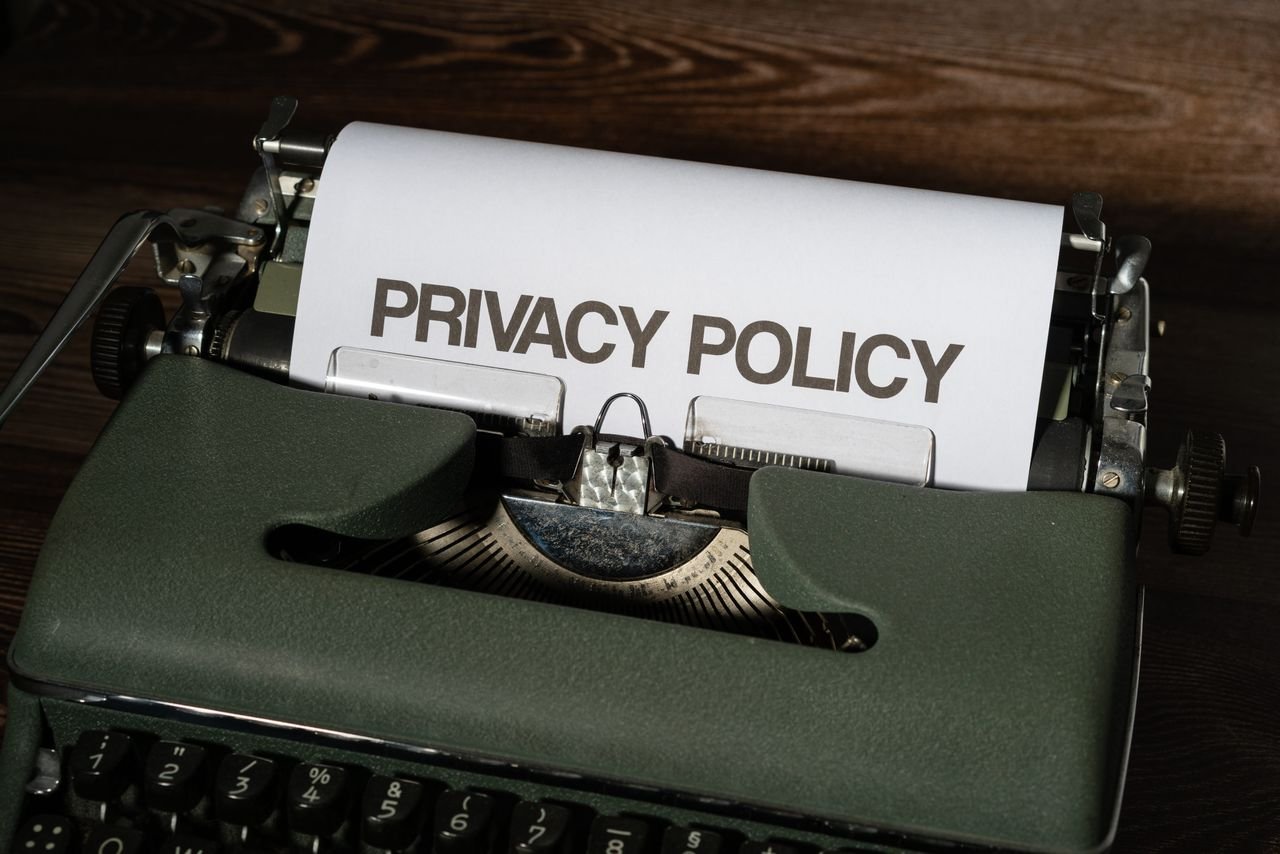 Typewriter with paper reading "Privacy Policy" rolled into the carriage